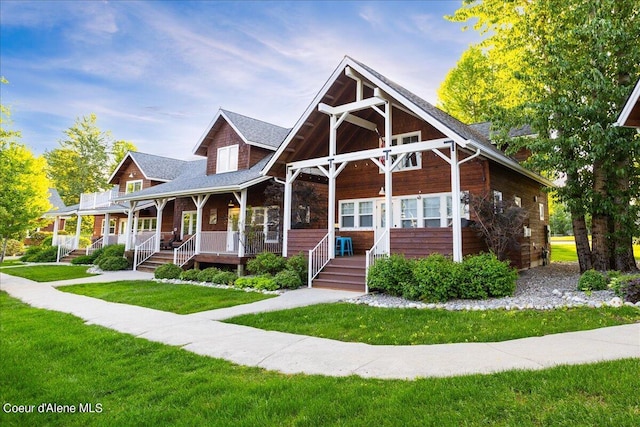232 Pomrankey Ln, Dover, ID 83825 - view of front facade with covered porch and a front lawn