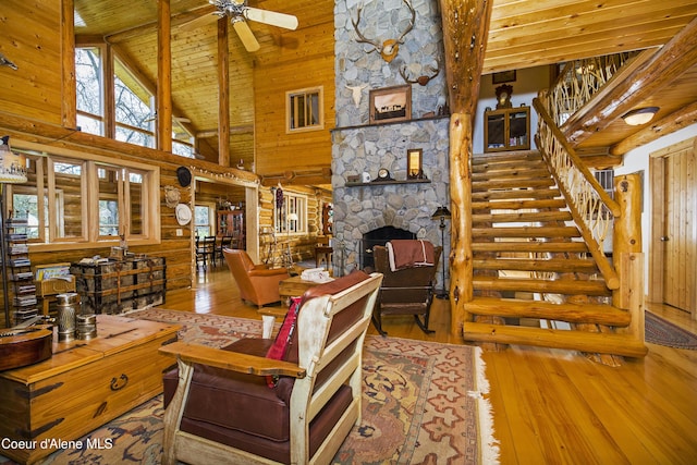 847 Willford Rd, Cocolalla, ID 83813 - living area featuring hardwood / wood-style flooring, high vaulted ceiling, wooden ceiling, stairway, and ceiling fan