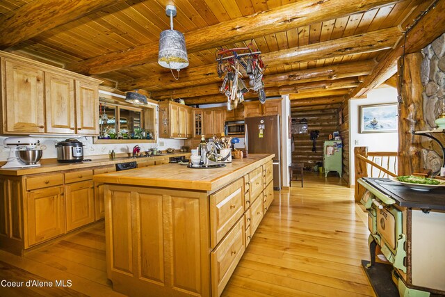 847 Willford Rd, Cocolalla, ID 83813 - kitchen with tile countertops, light wood-style floors, stainless steel appliances, wood ceiling, and beamed ceiling