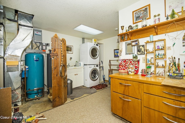 847 Willford Rd, Cocolalla, ID 83813 - washroom with stacked washer and clothes dryer and a textured ceiling