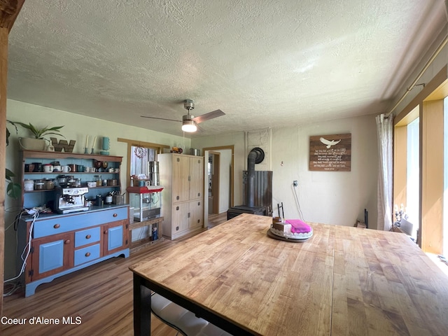 847 Willford Rd, Cocolalla, ID 83813 - dining area featuring a textured ceiling, wood finished floors, and a ceiling fan