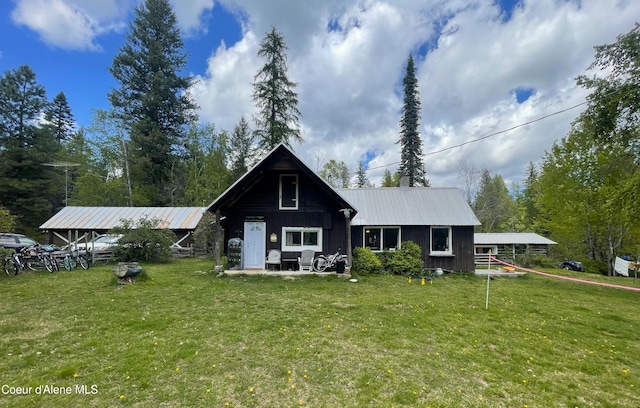 847 Willford Rd, Cocolalla, ID 83813 - back of property featuring a yard and a metal roof