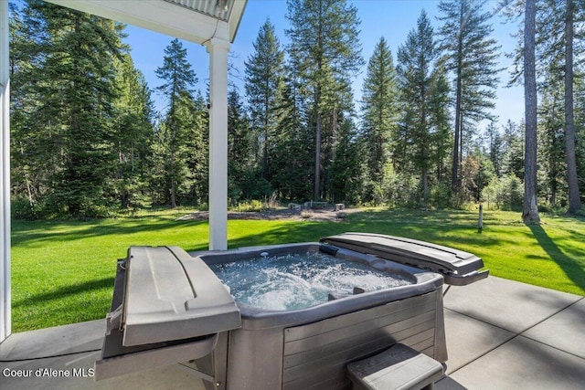 view of patio with a hot tub