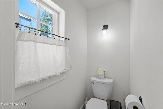 bathroom featuring toilet