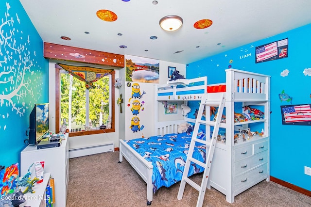 bedroom featuring baseboard heating, carpet, and baseboards