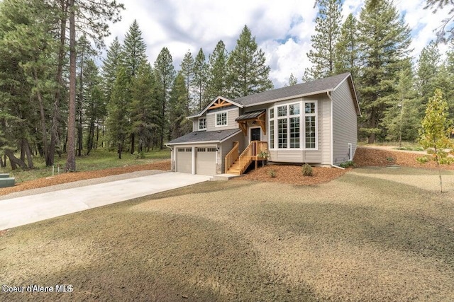 81 Parkland Dr, Blanchard, ID 83804 - split level home featuring an attached garage and concrete driveway