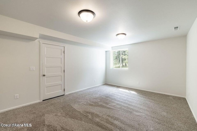 81 Parkland Dr, Blanchard, ID 83804 - spare room featuring carpet floors and baseboards