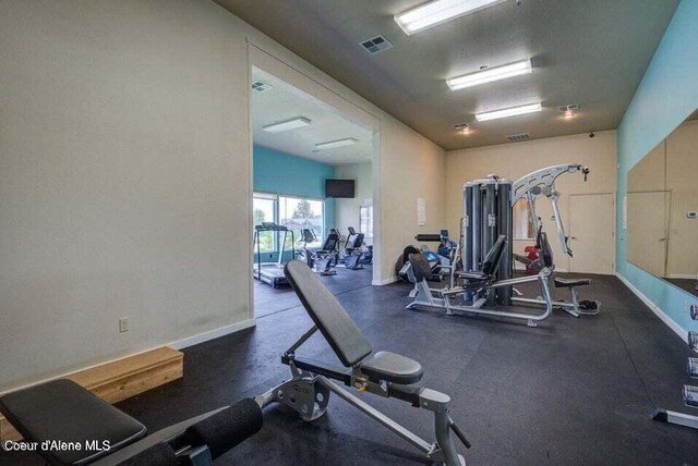 81 Parkland Dr, Blanchard, ID 83804 - workout area featuring baseboards