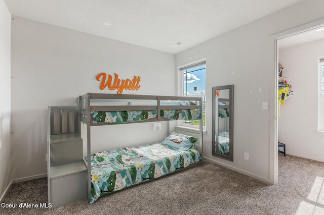 1749 N Minam Loop, Post Falls, ID 83854 - carpeted bedroom featuring baseboards