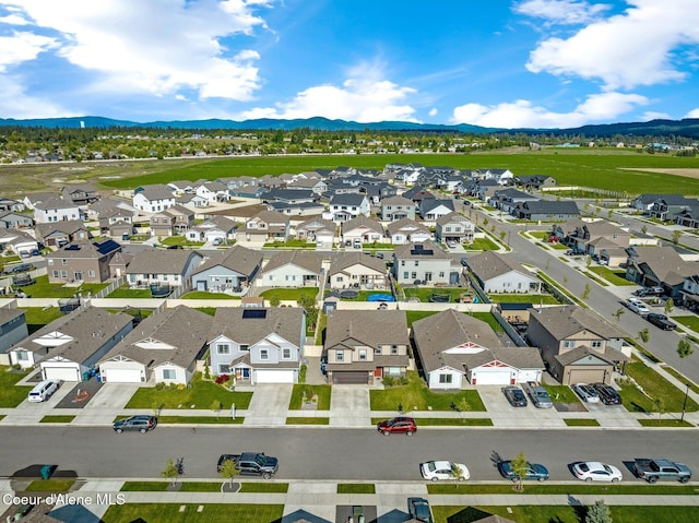 1749 N Minam Loop, Post Falls, ID 83854 - aerial perspective of suburban area featuring mountains