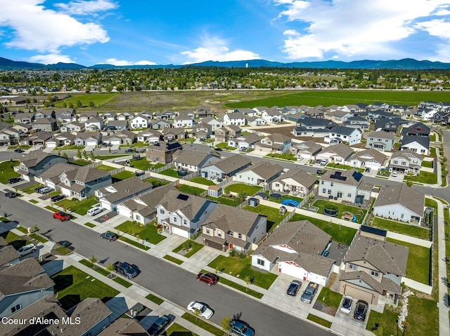 1749 N Minam Loop, Post Falls, ID 83854 - aerial view of residential area with a mountain backdrop