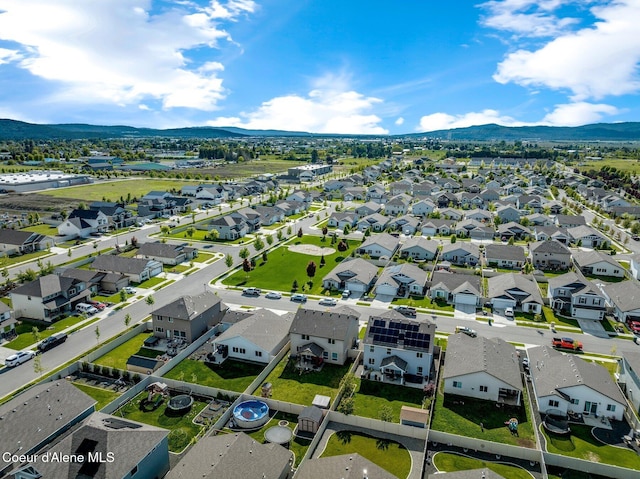 1749 N Minam Loop, Post Falls, ID 83854 - aerial perspective of suburban area with a mountainous background
