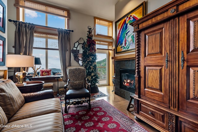 124 Village Ln Unit 108, Sandpoint, ID 83864 - living room with a fireplace and wood finished floors