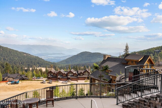124 Village Ln Unit 108, Sandpoint, ID 83864 - view of mountain backdrop with nearby suburban area