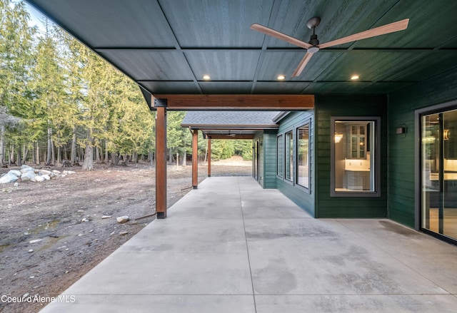 view of patio featuring ceiling fan
