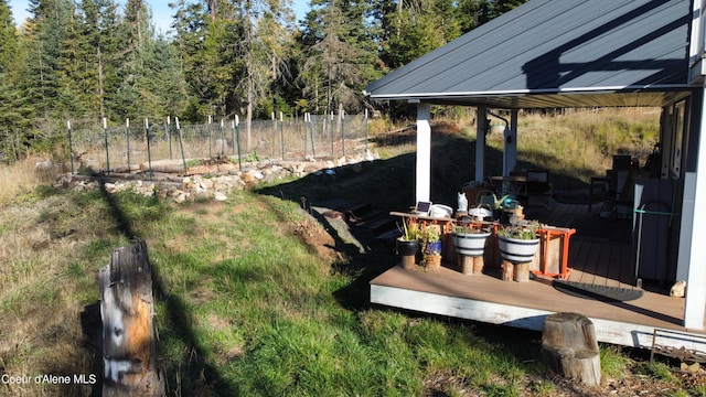 1428 W Elkhorn Meadows Rd, Fernwood, ID 83830 - view of yard featuring fence, a deck, and a forest view