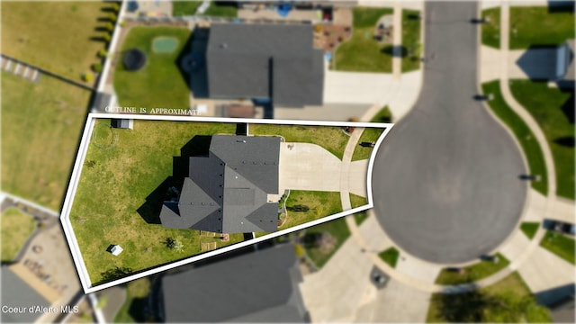 aerial view of property and surrounding area with property parcel outlined