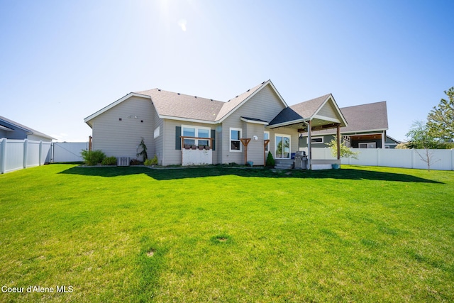 rear view of property featuring roof with shingles