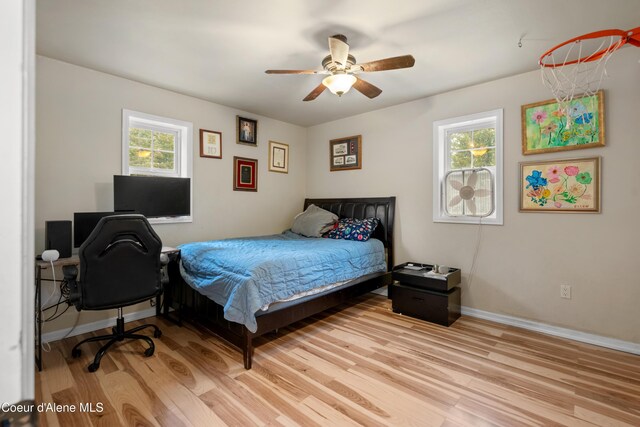 346 Brookfield Rd, Sandpoint, ID 83864 - bedroom featuring light wood-type flooring, baseboards, and ceiling fan