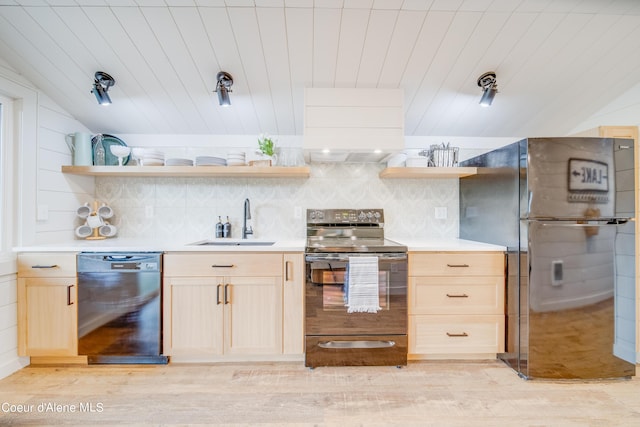 26312 S Anderson Drive Black Lake, Saint Maries, ID 83861 - kitchen with dishwashing machine, black range with electric cooktop, open shelves, freestanding refrigerator, and a sink