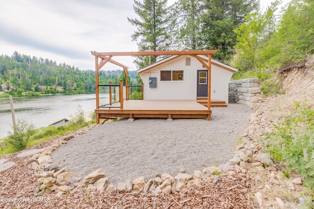 26312 S Anderson Drive Black Lake, Saint Maries, ID 83861 - view of outbuilding with a water view, an outdoor structure, and a view of trees