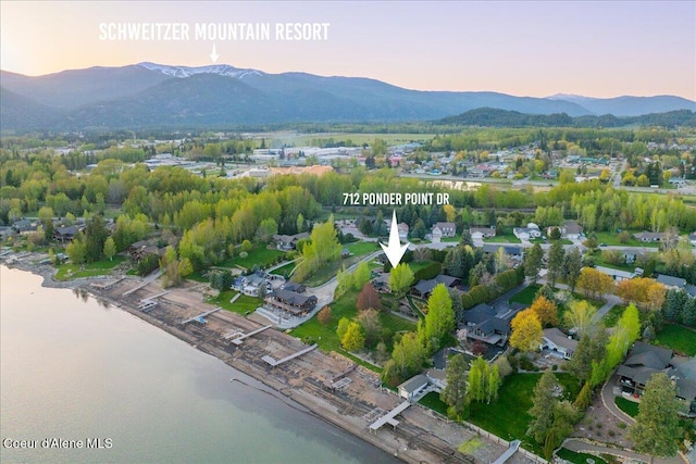 aerial overview of property's location with a water and mountain view