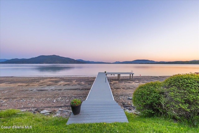 dock featuring a water and mountain view