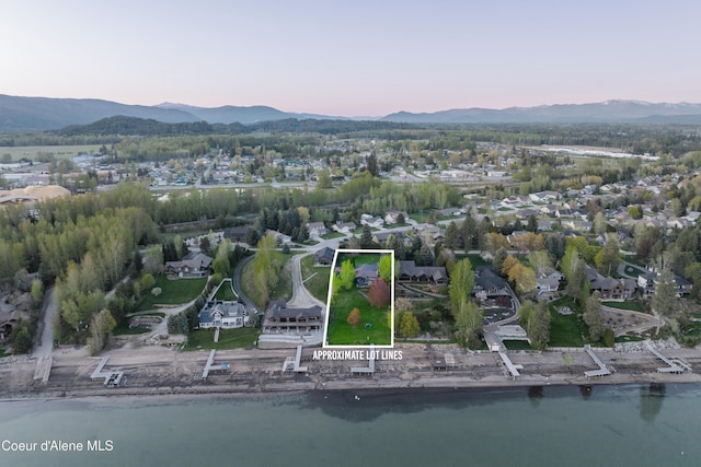 aerial view at dusk of a mountain view and property boundaries highlighted