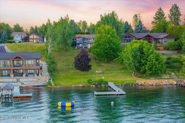 712 Ponder Point Dr, Sandpoint, ID 83864 - dock area featuring a water view and boat lift