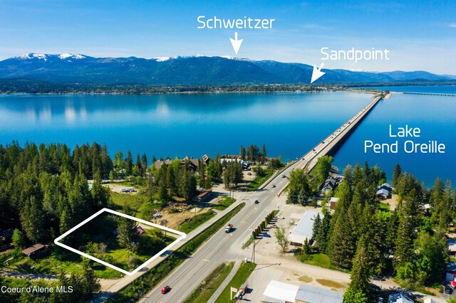 50 Smokehouse Rd, Sagle, ID 83860 - aerial view of property and surrounding area with a water and mountain view and property boundaries highlighted