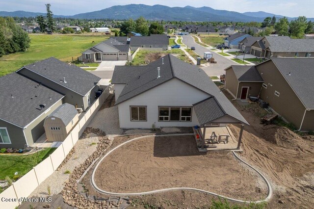 1451 W Tali Ave, Post Falls, ID 83854 - aerial view of residential area featuring a mountainous background
