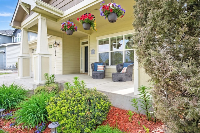 1823 N Clark Fork Pkwy, Post Falls, ID 83854 - view of patio / terrace with a porch