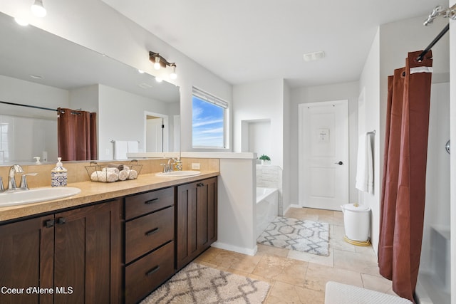 1823 N Clark Fork Pkwy, Post Falls, ID 83854 - full bathroom featuring a garden tub, double vanity, and backsplash