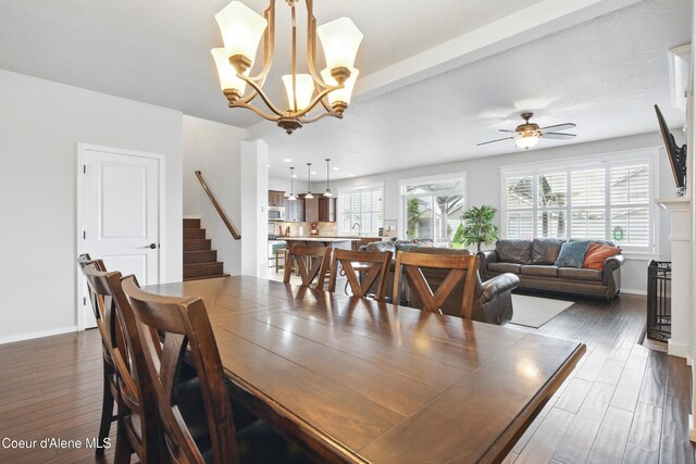 1823 N Clark Fork Pkwy, Post Falls, ID 83854 - dining room with wood finished floors, a chandelier, stairway, and baseboards