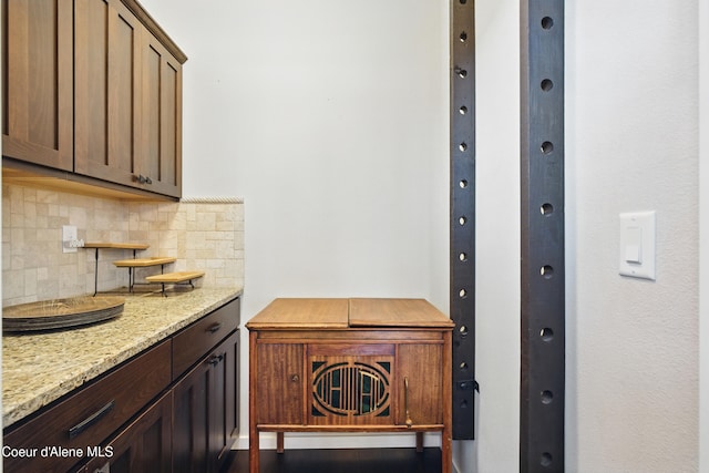 1823 N Clark Fork Pkwy, Post Falls, ID 83854 - interior space featuring decorative backsplash and light stone counters