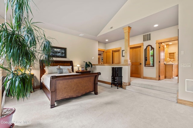 679 Comeback Bay Ln, Sagle, ID 83860 - bedroom with lofted ceiling, light carpet, recessed lighting, decorative columns, and baseboards