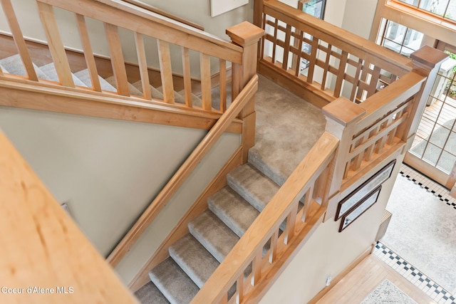 679 Comeback Bay Ln, Sagle, ID 83860 - stairs with plenty of natural light and tile patterned flooring