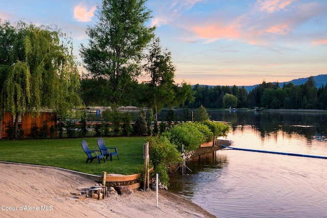 679 Comeback Bay Ln, Sagle, ID 83860 - view of home's community with a yard and a water view