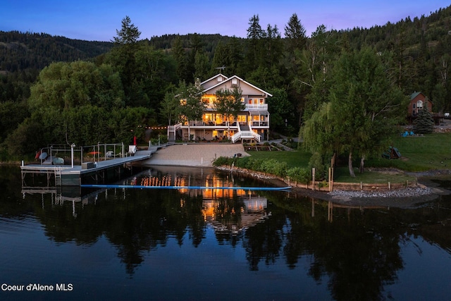 679 Comeback Bay Ln, Sagle, ID 83860 - water view featuring a heavily wooded area and a boat dock