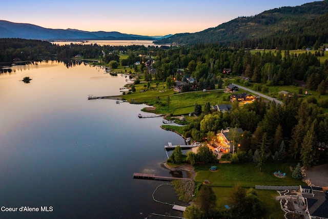 679 Comeback Bay Ln, Sagle, ID 83860 - aerial view of property and surrounding area with a water and mountain view and a heavily wooded area