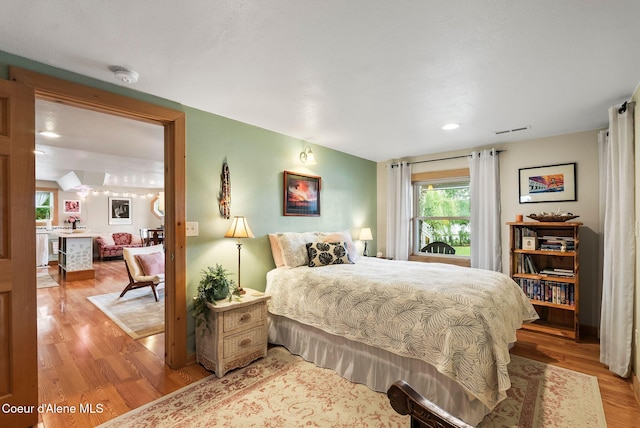 679 Comeback Bay Ln, Sagle, ID 83860 - bedroom featuring light wood finished floors