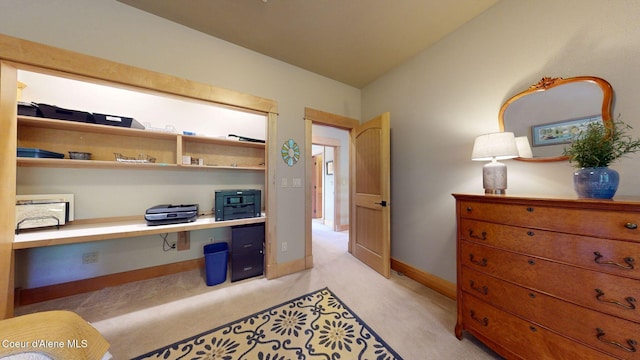 679 Comeback Bay Ln, Sagle, ID 83860 - home office with light colored carpet, built in study area, and baseboards
