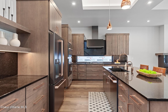 2855 W Lumber Ln, Coeur Dalene, ID 83814 - kitchen with a sink, high end refrigerator, wall chimney exhaust hood, dishwasher, and light wood-style floors