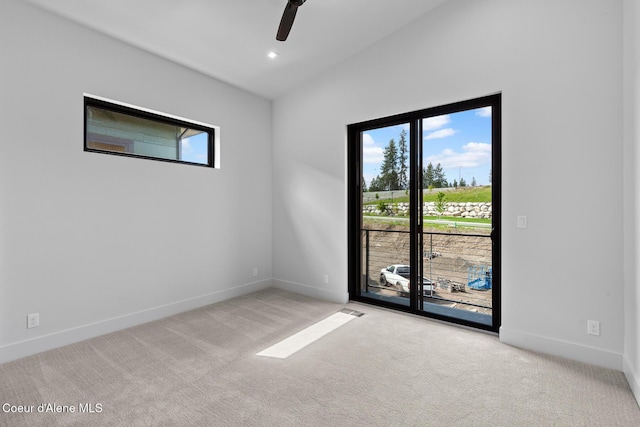 2855 W Lumber Ln, Coeur Dalene, ID 83814 - empty room with a ceiling fan, carpet floors, baseboards, and lofted ceiling
