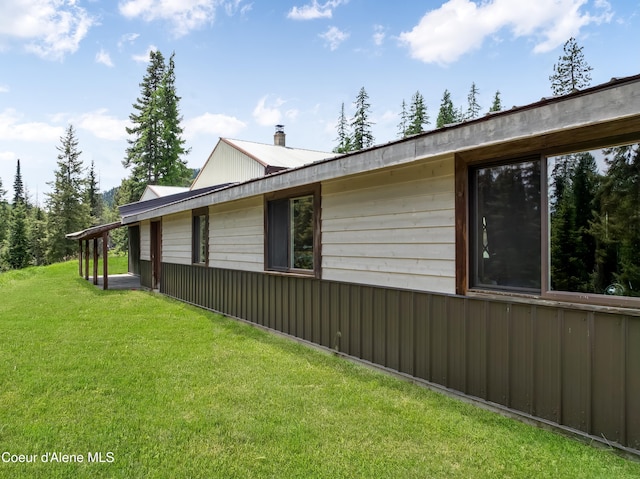 435 Shady Pines Loop, Priest Lake, ID 83856 - view of side of property featuring a lawn