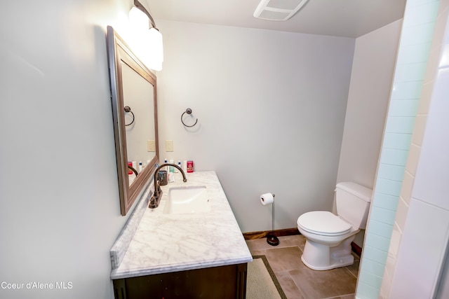 435 Shady Pines Loop, Priest Lake, ID 83856 - full bathroom featuring vanity, toilet, tile patterned floors, and baseboards