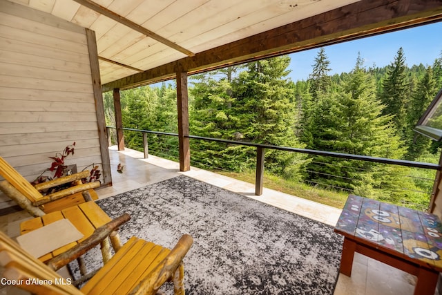 435 Shady Pines Loop, Priest Lake, ID 83856 - view of patio with a wooded view