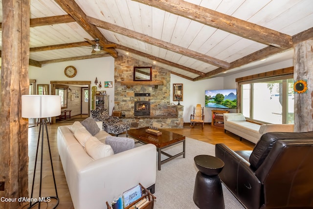 435 Shady Pines Loop, Priest Lake, ID 83856 - living room featuring wooden ceiling, wood finished floors, ceiling fan, and a fireplace
