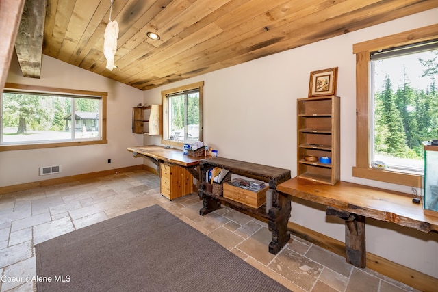 435 Shady Pines Loop, Priest Lake, ID 83856 - dining room featuring stone tile flooring, healthy amount of natural light, lofted ceiling, baseboards, and wooden ceiling