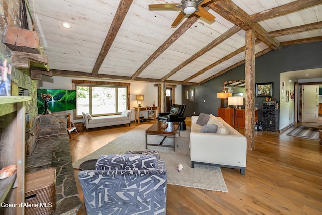 435 Shady Pines Loop, Priest Lake, ID 83856 - living room featuring hardwood / wood-style floors, wood ceiling, a ceiling fan, a stone fireplace, and recessed lighting